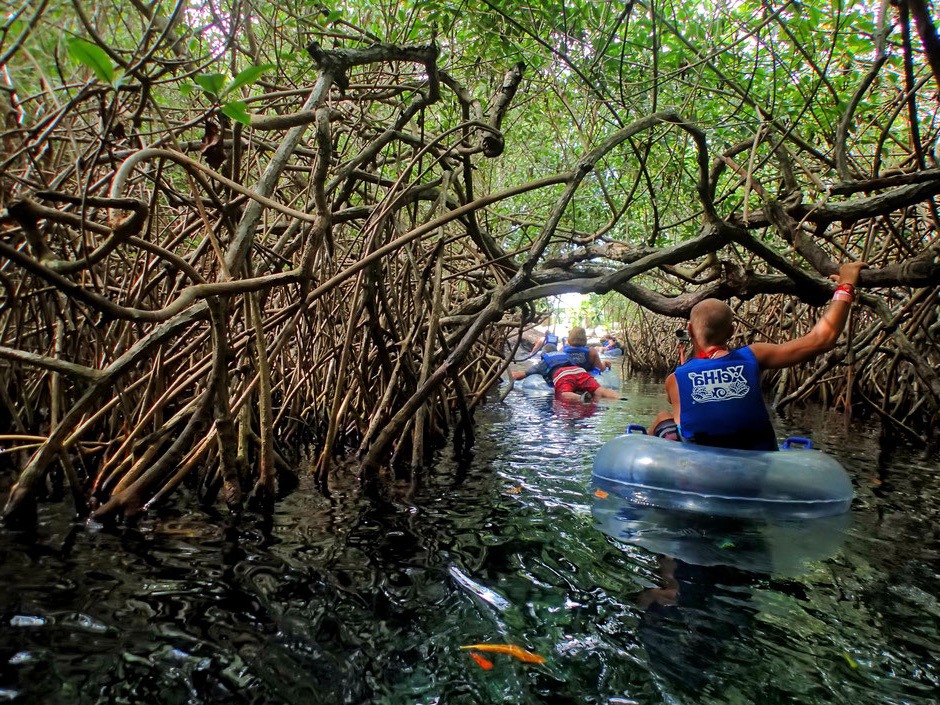 Guests floating on inner tubes along Xel-Ha's lazy river